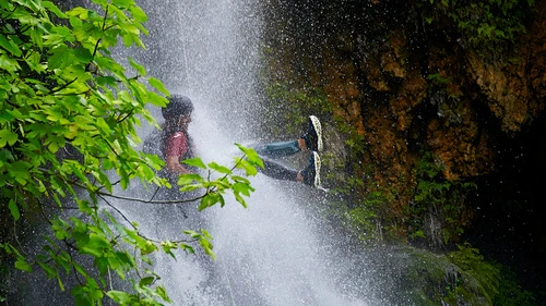 Showering in a waterfall can be a unique and exhilarating experience, but it's important to do so safely and responsibly